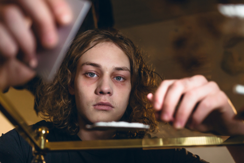 man about to use cocaine, experiencing how does cocaine affect the nervous system and other symptoms