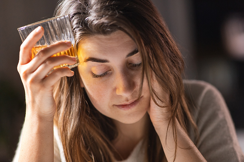 A woman struggles with both alcoholism and depression.