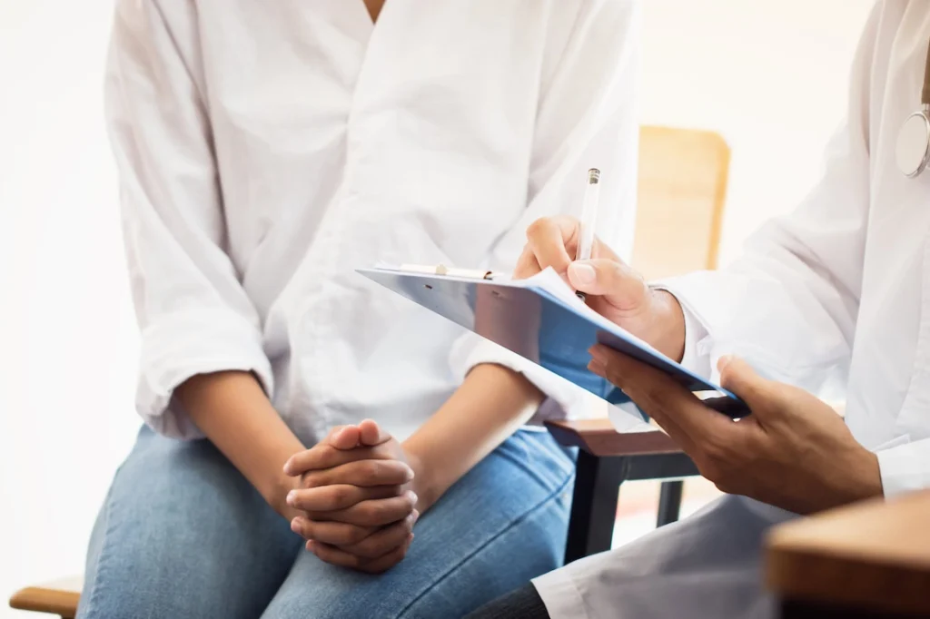A person participates in therapy at a drug rehab center.